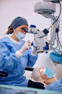 doctor in scrubs prepares for retinal tear surgery